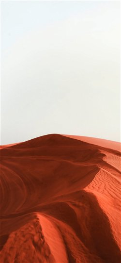 خلفية  تلال رمال الصحراء الداكنة البنية  للجوال