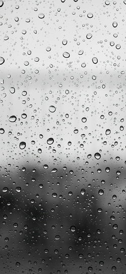 خلفية نقاط ماء على زجاج رمادي للايفون